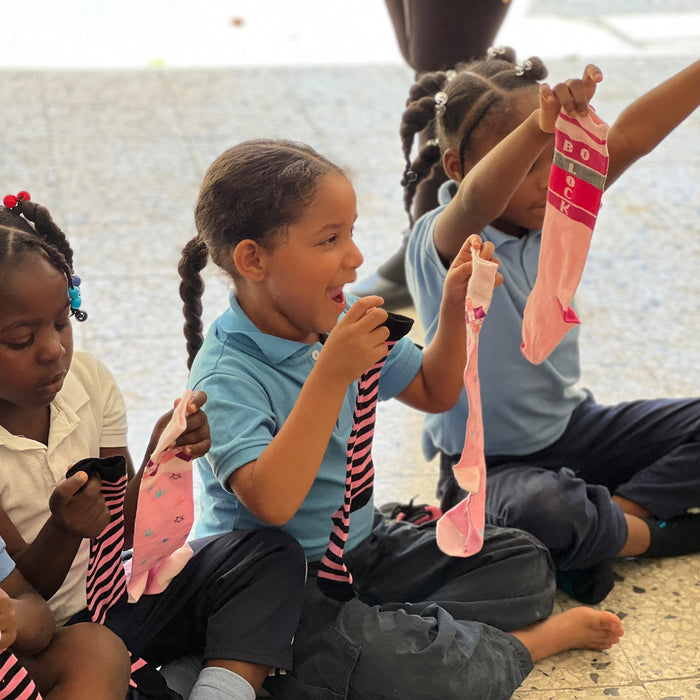 PMF Provides thousands of socks for children in need