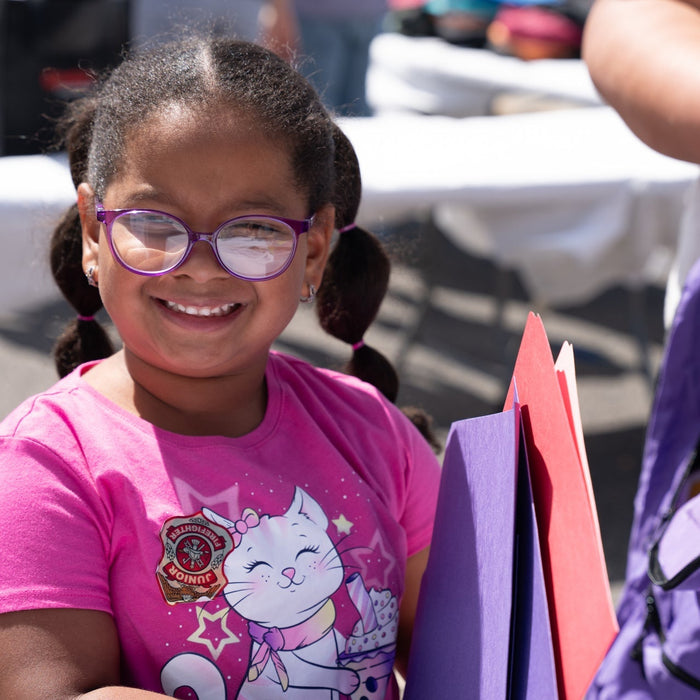 A Day of fun and hope for families in Lawrence, MA with our Back to School Drive