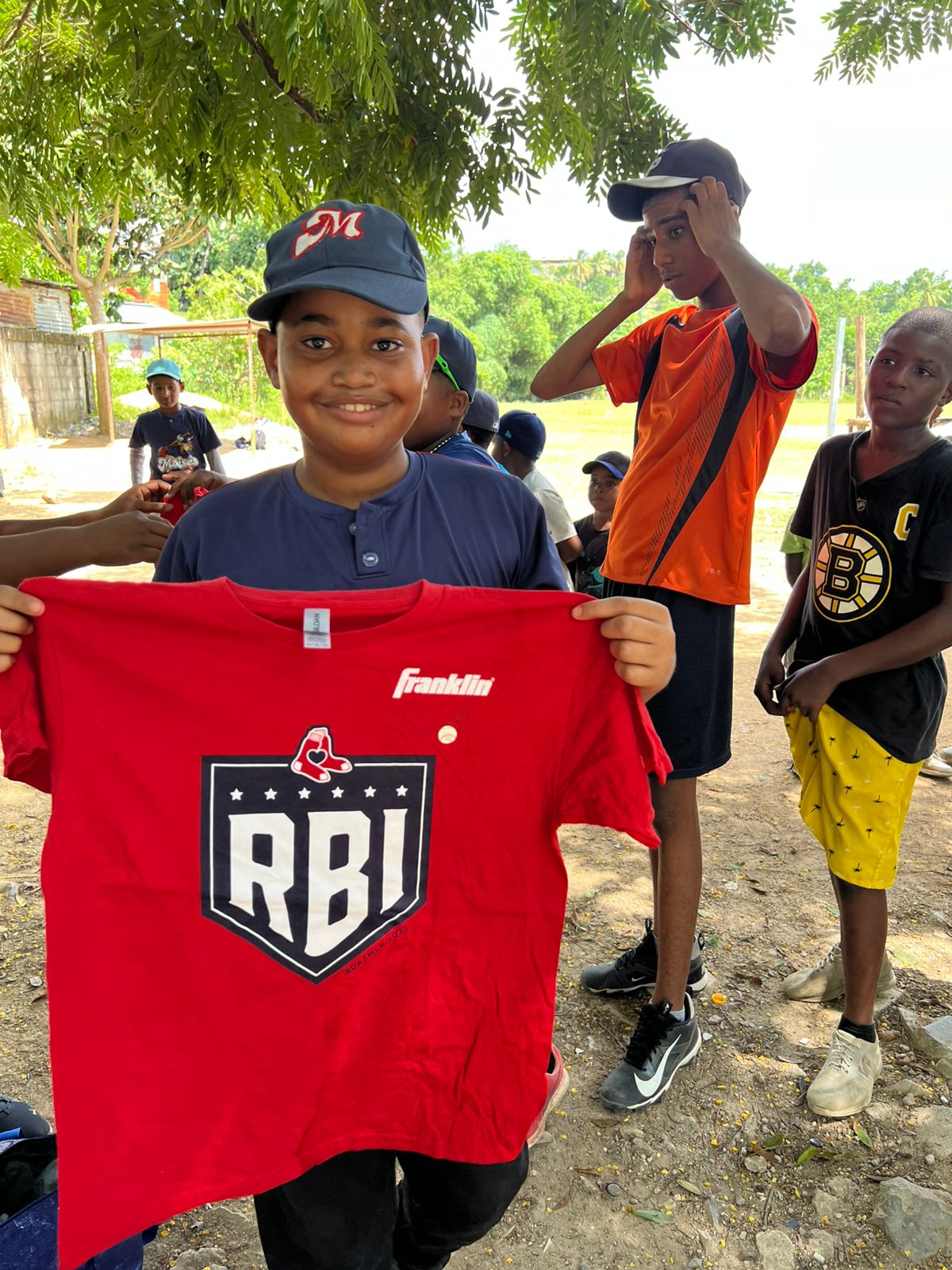 Bull League Supports Villa Verde Children with T-Shirt and Cap Donation