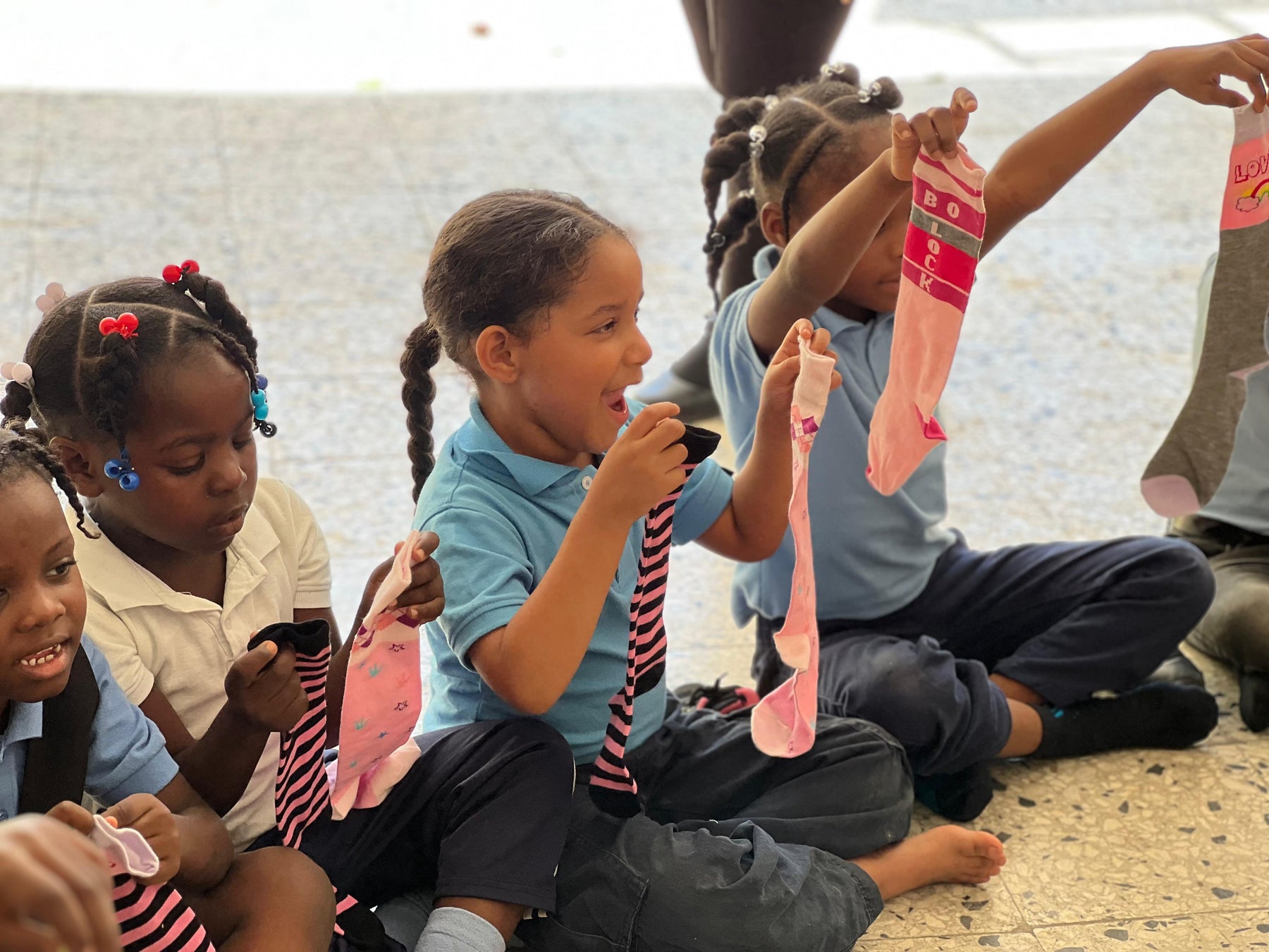 PMF Provides thousands of socks for children in need